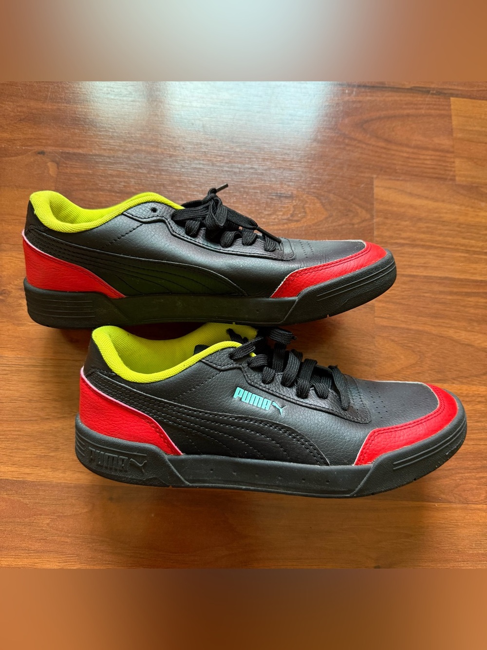 Puma Caracal sneakers men's size 7.5 women's size 9 black high-risk red nrgy